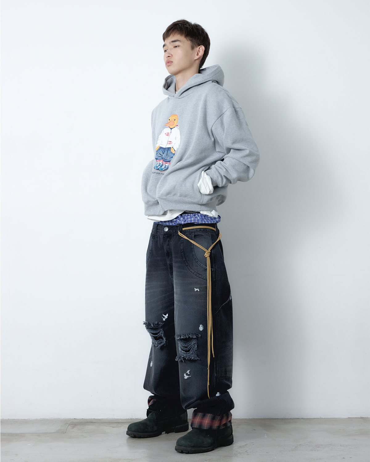 CALÇA JEANS CURVAS BARRA XADREZ